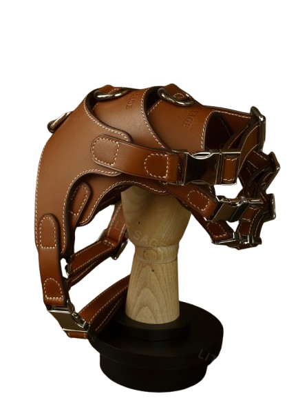 Luxury Leather Pet Harness displayed on a wooden stand, showcasing its elegant design and premium materials.